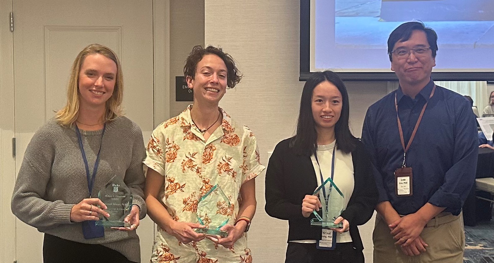 Dr. Lee Zou, right, stands with Fitzgerald Scholars Rebeccah (Becky) Stewart (left), Abbie Ireland (center left), and Dr. Yaosi Liang (center right).