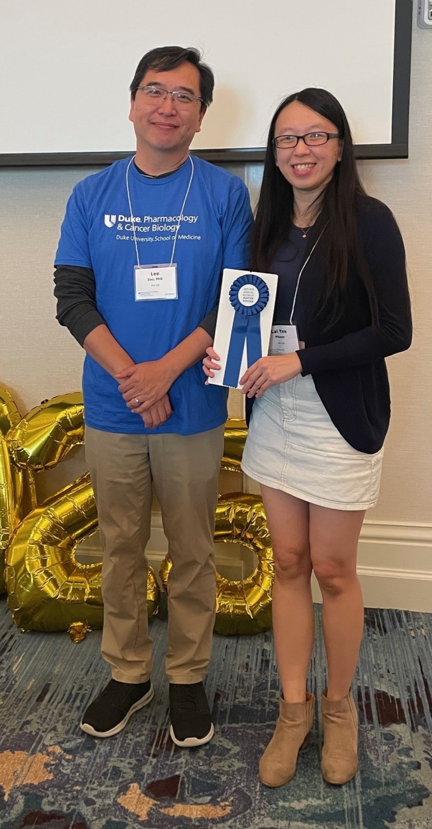 Dr. Lee Zou, left, stands with 2025 Poster Awardee Lai Yee Phoon.