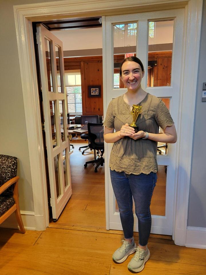 Hannah Thrash stands with 1st place trophy